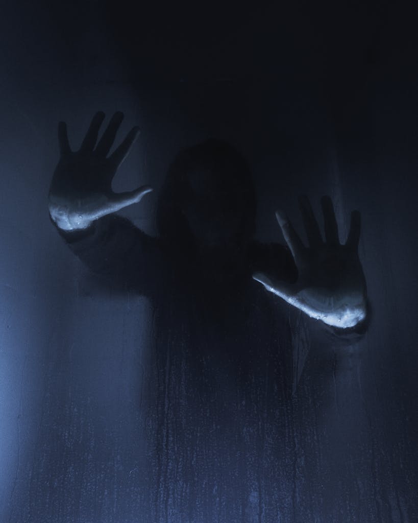 Woman Silhouette in Darkness
